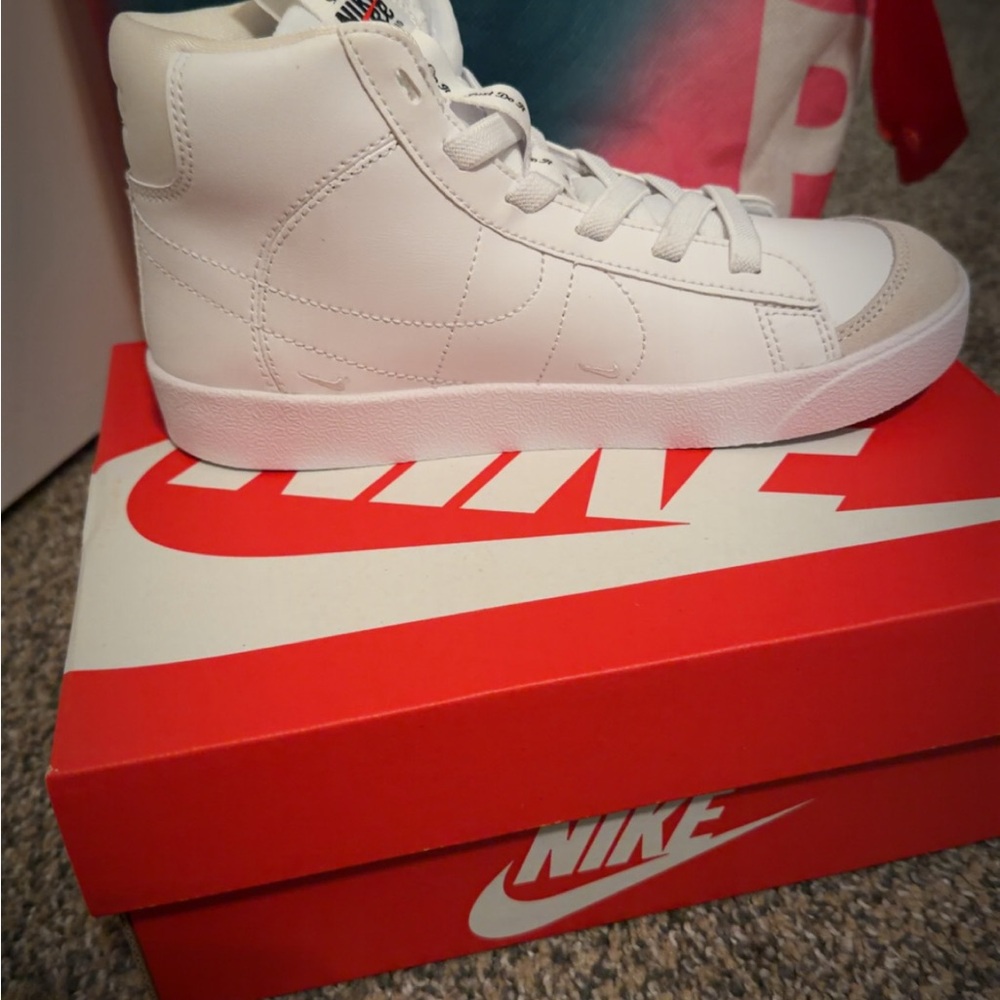 Nike Kid’s White High-Top Sneakers 
Size: 2.5
New- never worn